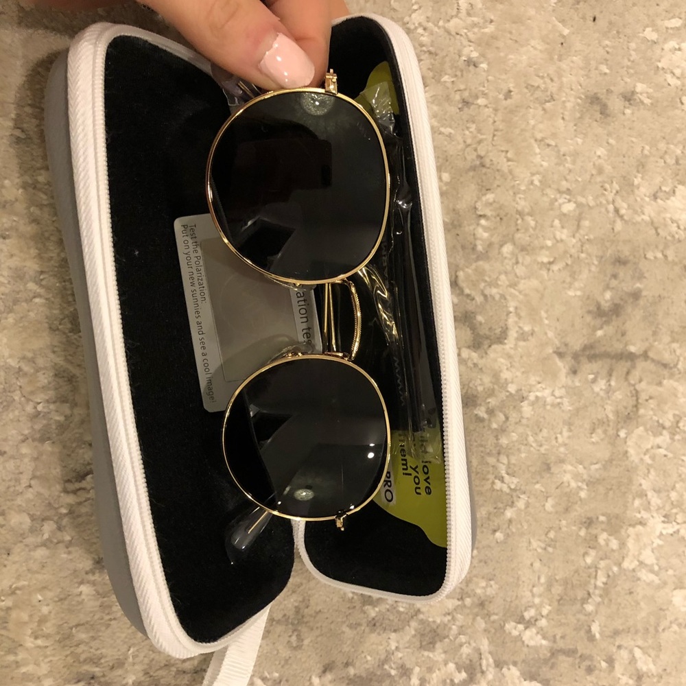 Brand new sunglasses black frame gold rim